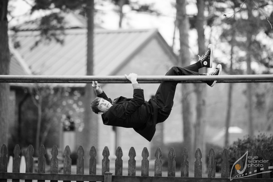 New Orleans Wedding Groomsmen Plays on Mokeybars in Suit Chuck Taylor Shoes