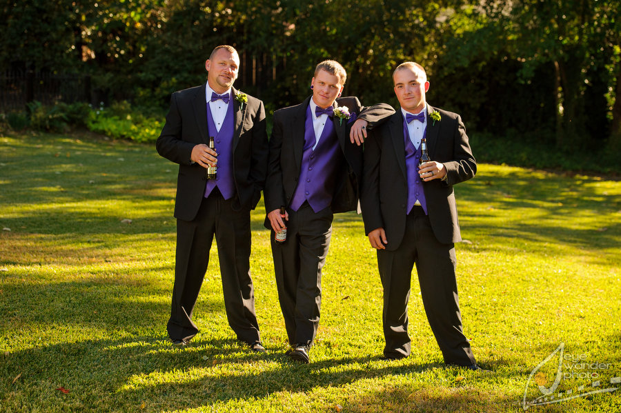 Cedar Grove Inn Vicksburg Wedding Groom Groomsmen Drink Beer Outside in Tuxes Purple Vest