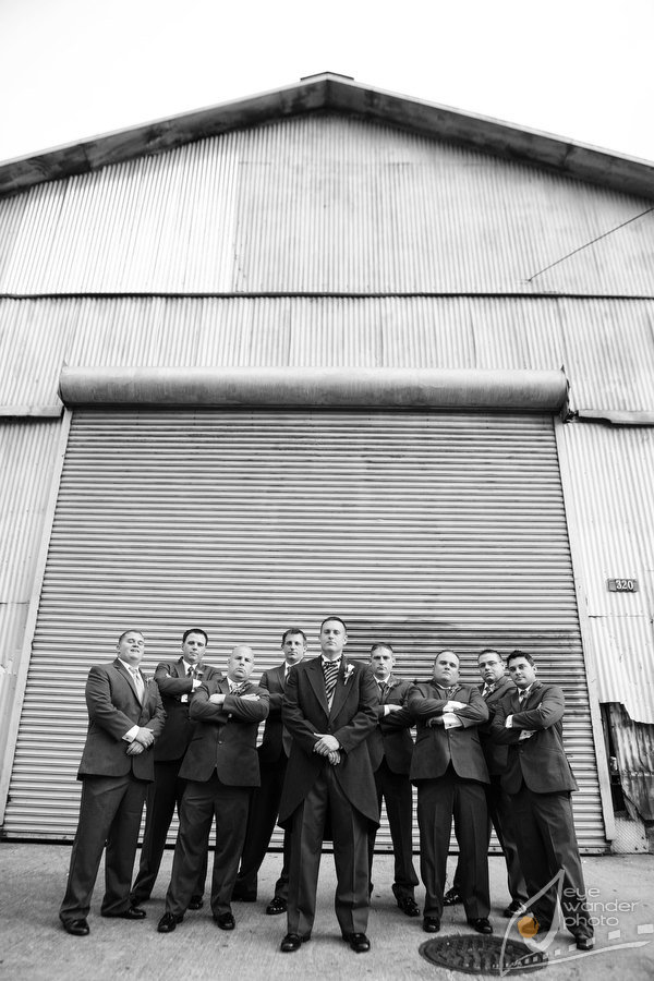 Louisiana Wedding Groom Groomsmen Stand Old Roll Up Garage Door