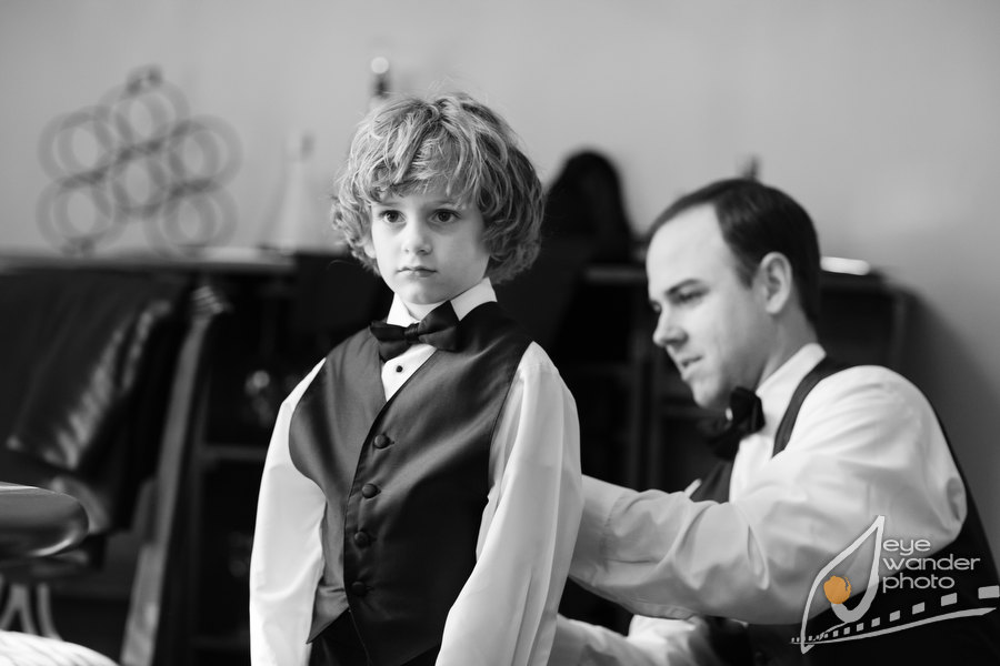 Children at Weddings Ring Bearer putting on suit vest