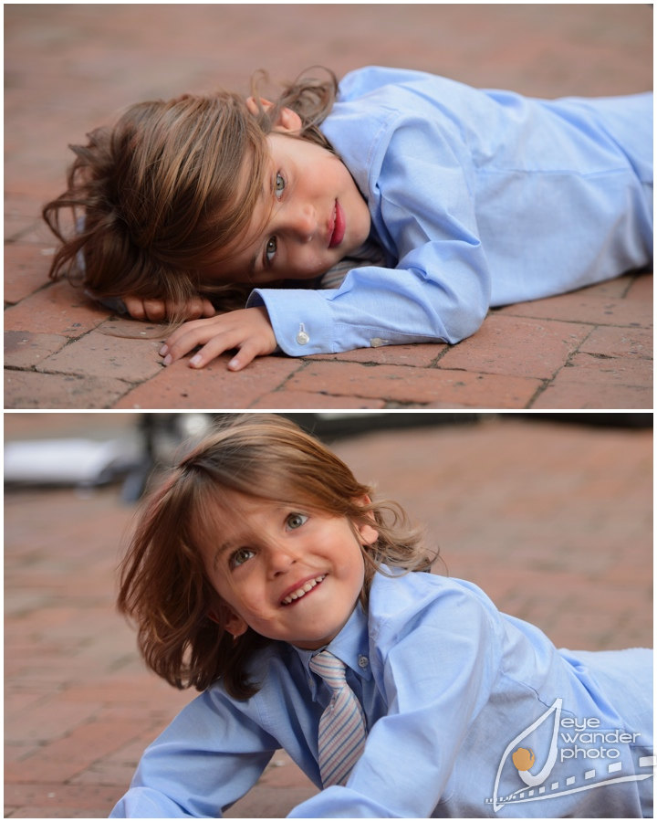 Kids at weddings little boy laying on brick