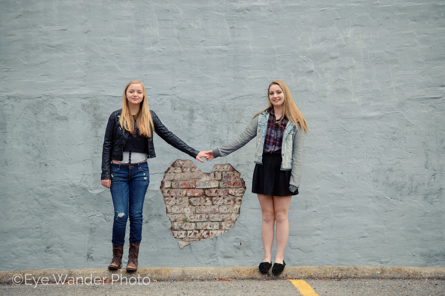creative photo shoot, loving sisters, heart on wall, art photo, family photography 