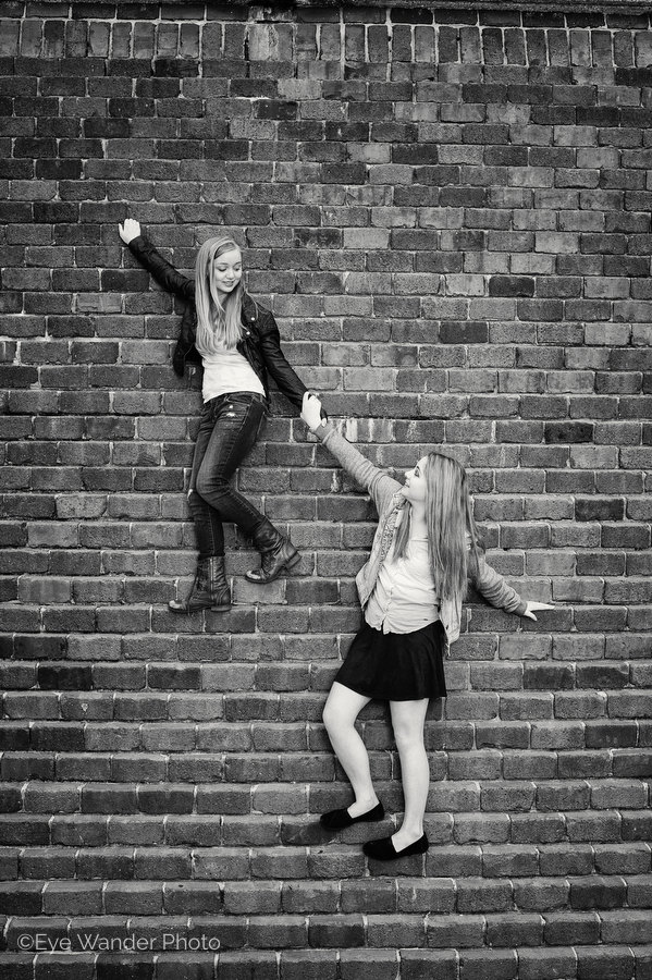 black & white photos, family photos, artistic photos, humorous photos, baton rouge, sisters climbing up a wall