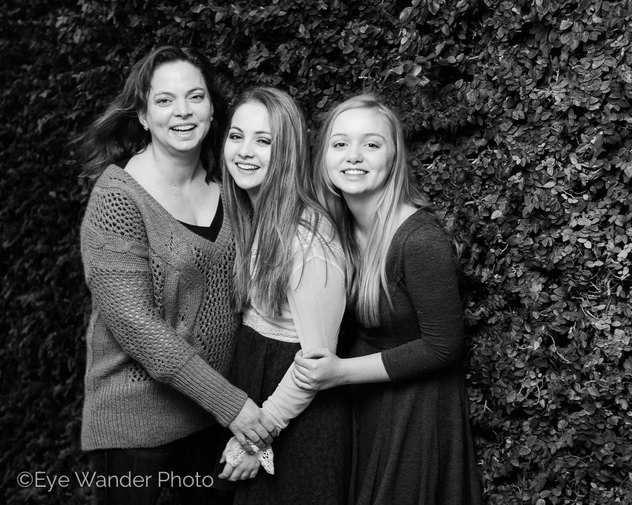 family photo shoot, Mom & daughters, family bonds, ivy wall, black & white photos, laughter 